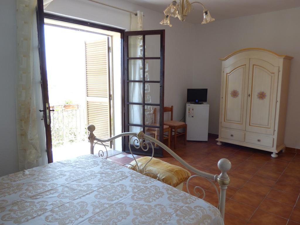פורטו אוטיאולו B&B Baia Turchese חדר תמונה