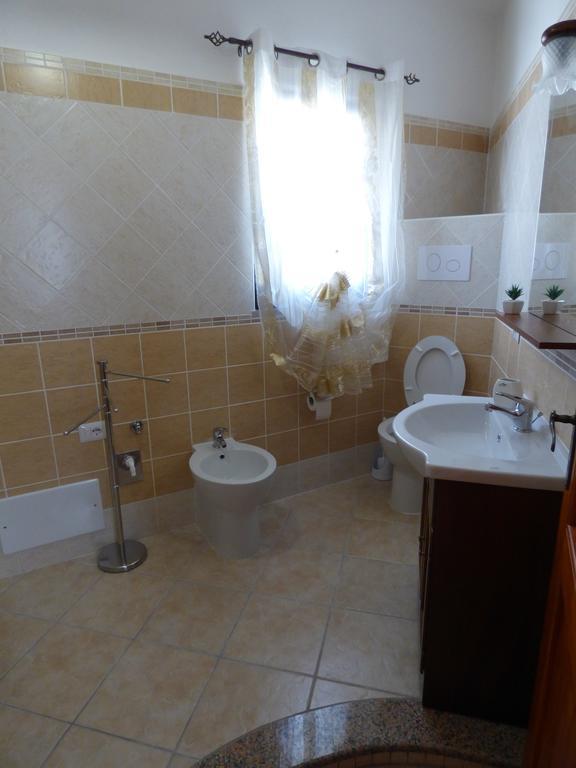פורטו אוטיאולו B&B Baia Turchese חדר תמונה
